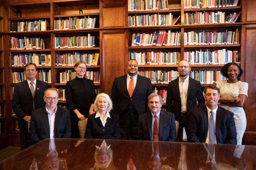 Group faculty photo in Fincher Library