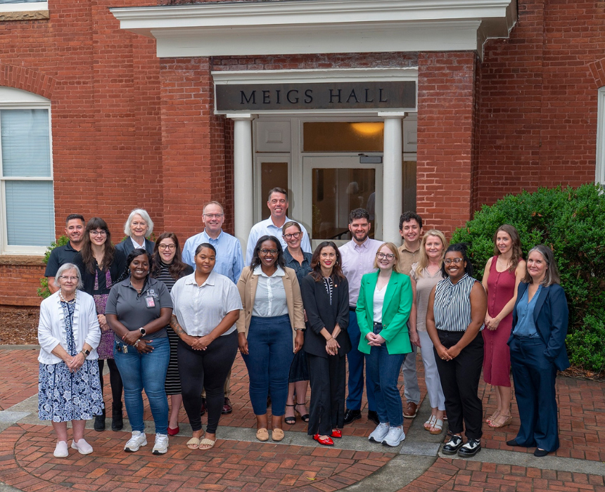 Faculty and Staff pictured outside of Meigs Hall