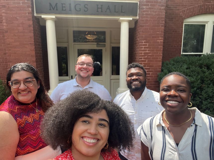 PhD students in front of Meigs Hall