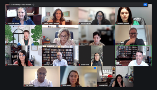 A screenshot of a zoom call with 15 people. 