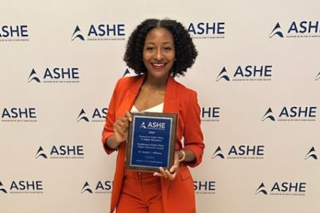 Krystal L. Williams recieves award at ASHE