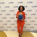 Krystal L. Williams recieves award at ASHE