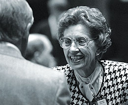 Louise McBee on the floor of the State House of Representatives talking to fellow legislator (unidentified). Photo taken 1/13/92. (University of Georgia/ University of Georgia, Rick O'Quinn).